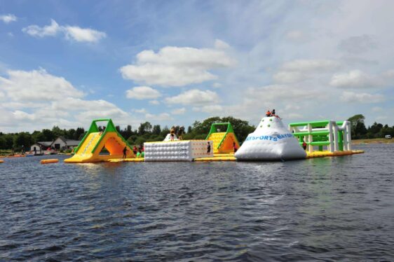 Baysports inflatable waterpark in the river with slides and climbing frames