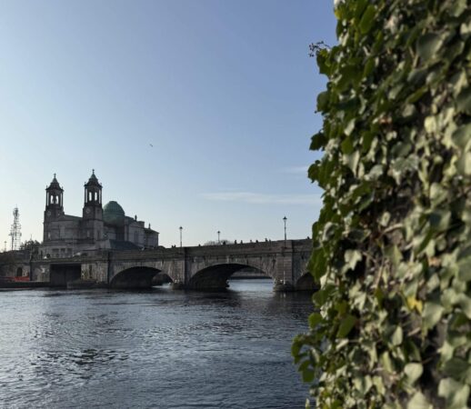 Riverside view of the main bridge in Athlone with St Peter & Paul's Church in the background