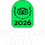 Bright green 2026 Travellers' Choice badge with owl logo, indicating award-winning hotel and top guest reviews for bookings